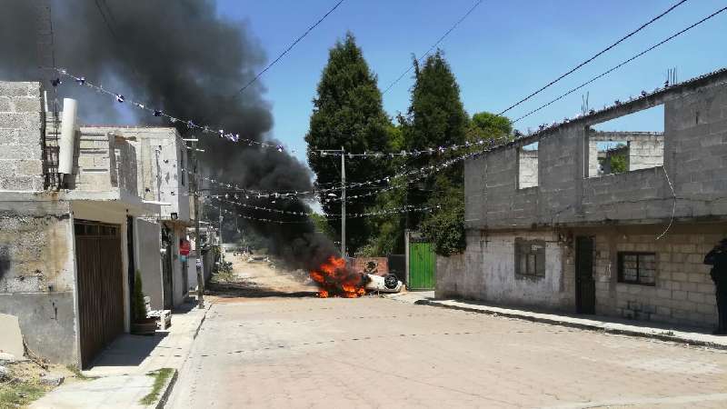 Tras robo y trifulca localizan cajas de mariguana en Tepetitla