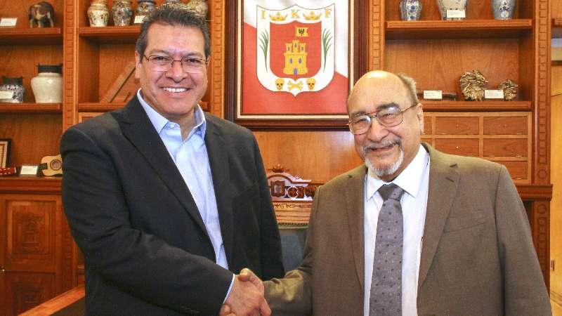 Mena se reúne con Austin, investigador emérito de la UNAM